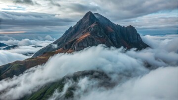mountain-peak-shrouded-clouds.jpg