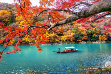 boatman-punting-boat-river-arashiyama-autumn-season-along-river-kyoto-japan.jpg